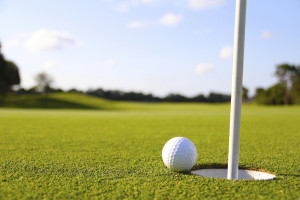 Golf ball at hole